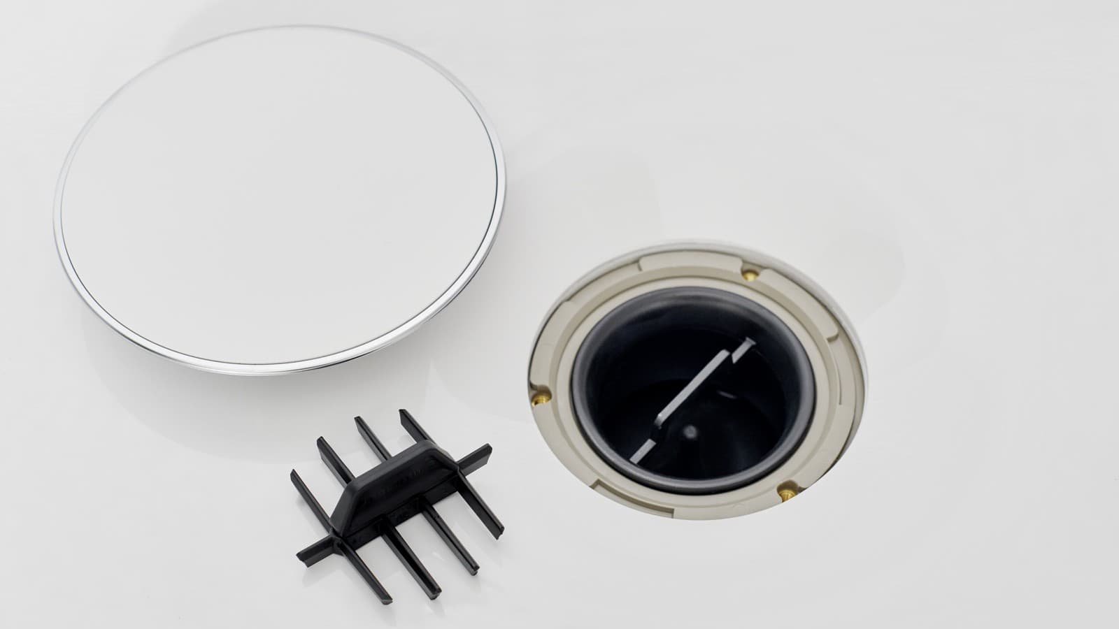 Äravoolu kate ja kammsüdamik Äravoolu kate ja kammsüdamik